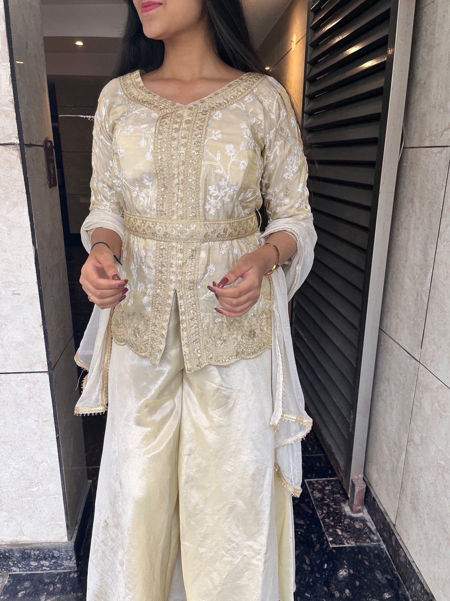 Ivory hand embroidered peplum top with sharara set