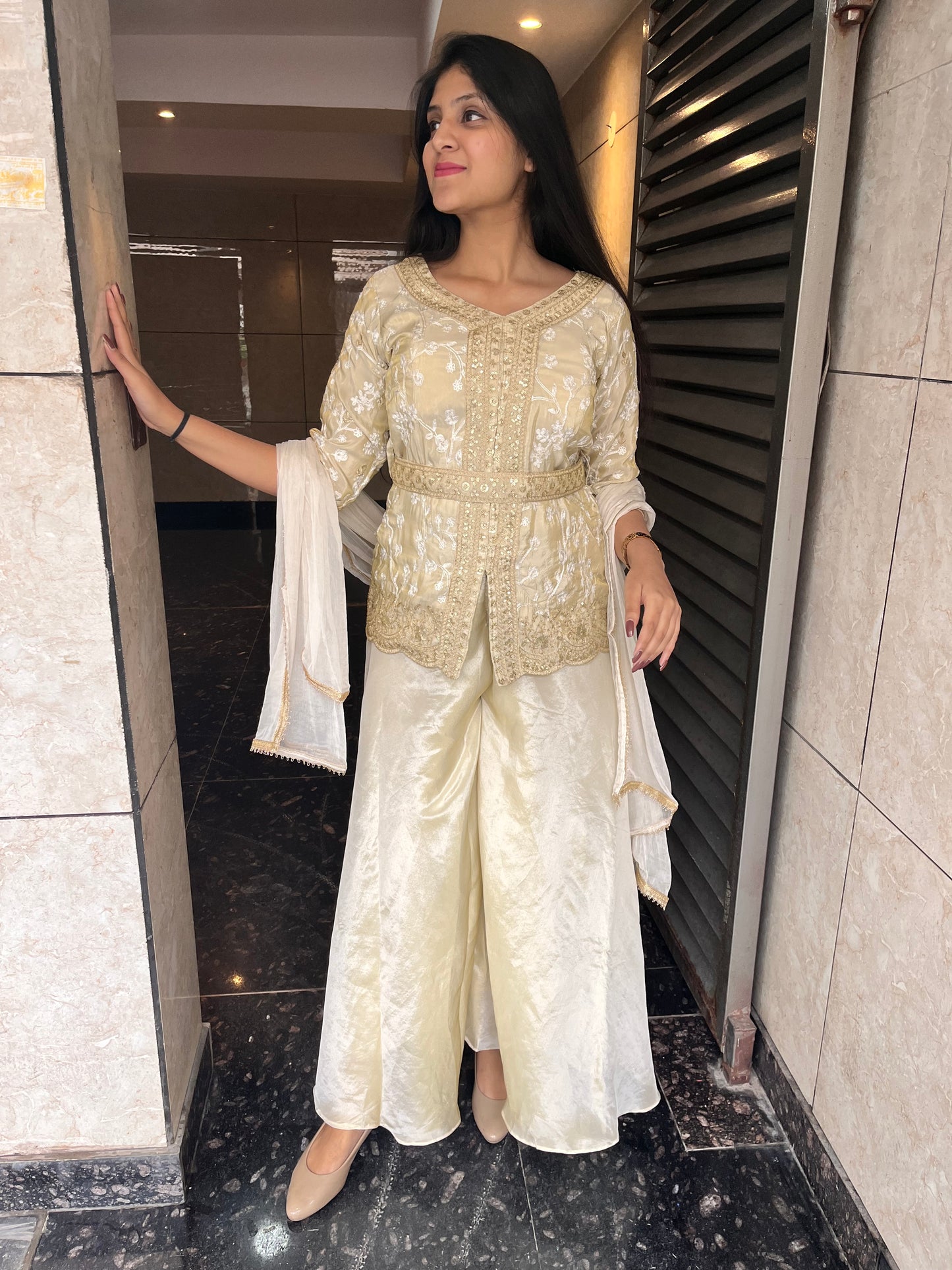 Ivory hand embroidered peplum top with sharara set