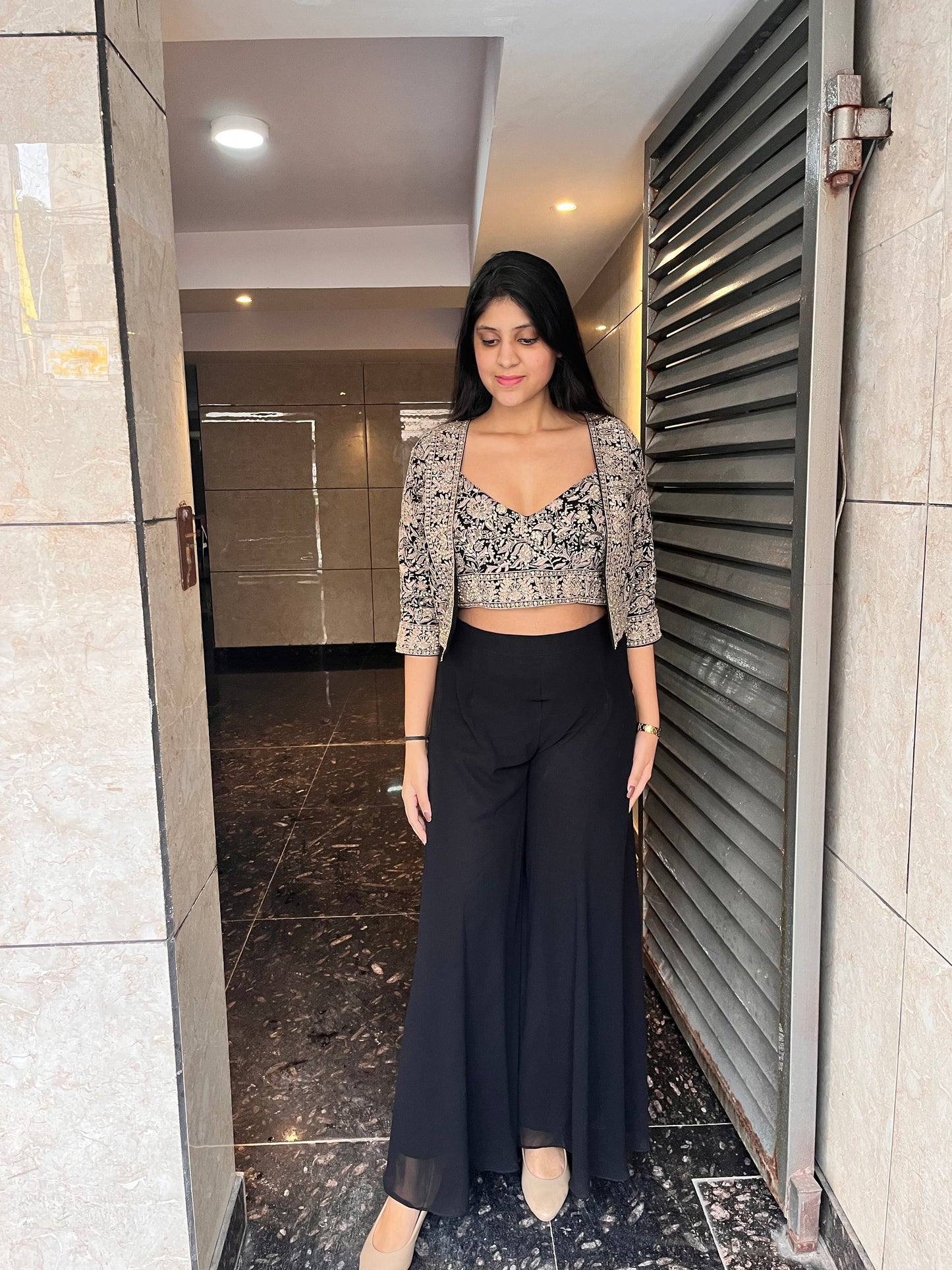 Party wear black sharara set with hand embellished jacket