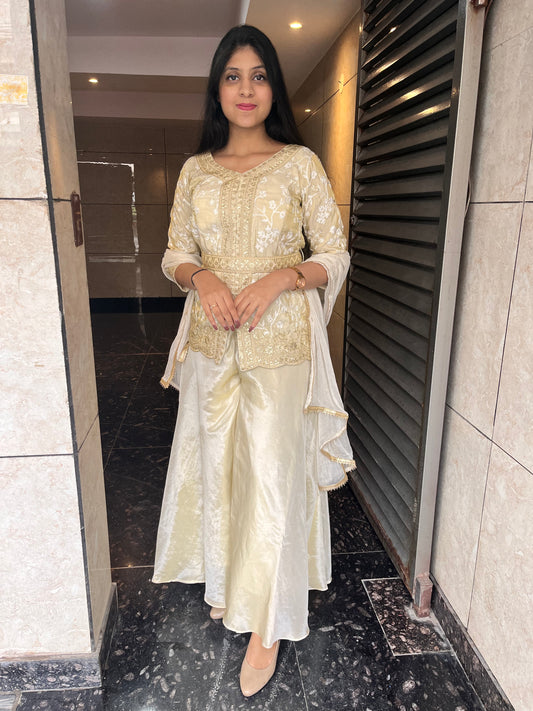 Ivory hand embroidered peplum top with sharara set